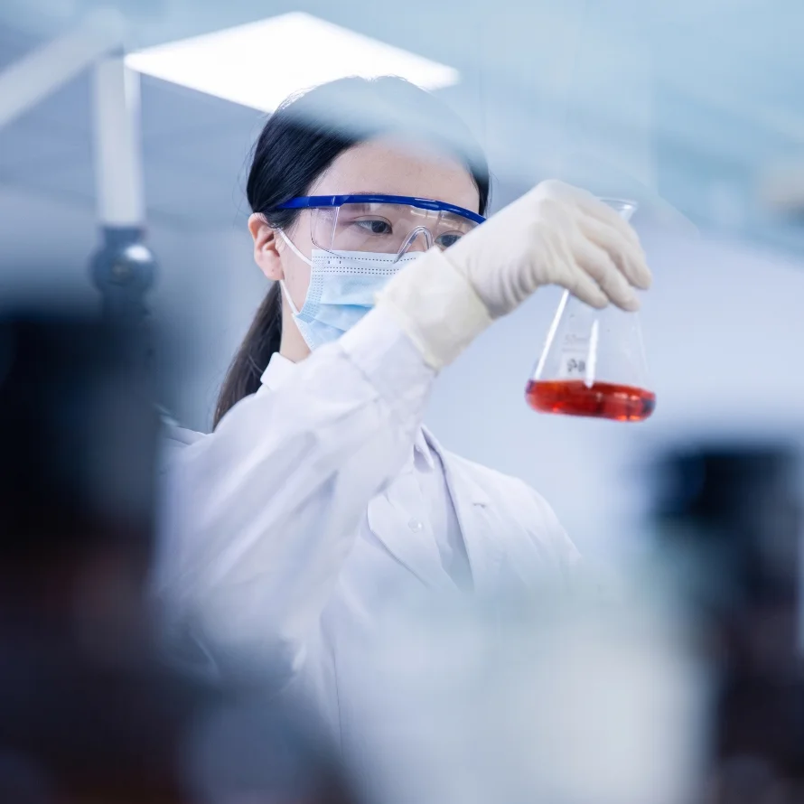 Lab scientist reviewing a peptide sample